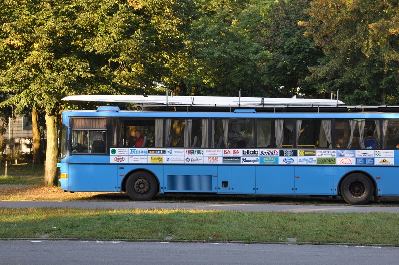 Bus with a boat on top.JPG